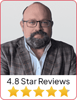 Alexander Memmen, Esq., a bearded man with glasses, poses in front of 4.8  stars, symbolizing  legal achievements.